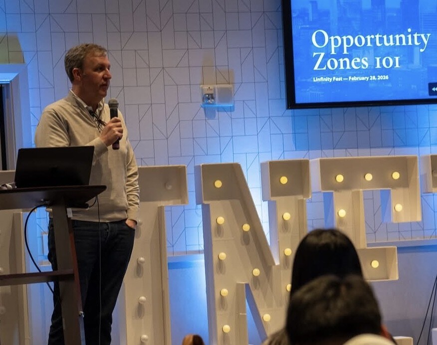 Barrett Linburg speaking at Linfinity Fest, presenting Opportunity Zones 101, February 2026